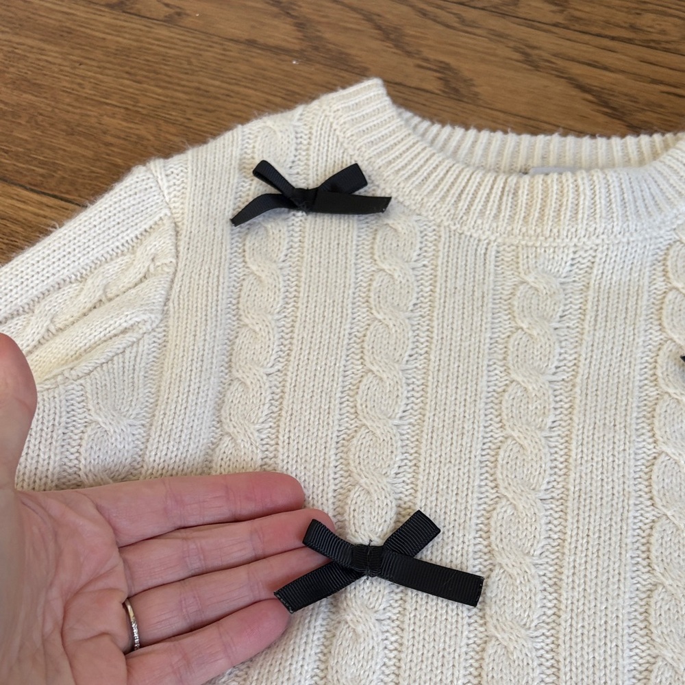 RSQ Cream Cable Knit Sweater with Black Bows - Picture 3 of 3